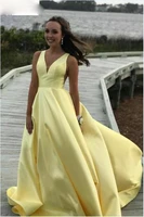 yellow prom dresses v neck satin sleeveless robe de soiree celebrity party dresses a line plunging back cheap evening dresses
