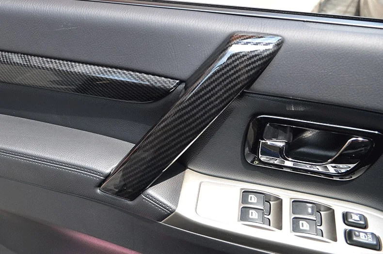 Декоративные накладки на салонные ручки обивки дверей под карбон для Mitsubishi Pajero IV Мицубиси Паджеро 4 2008- год