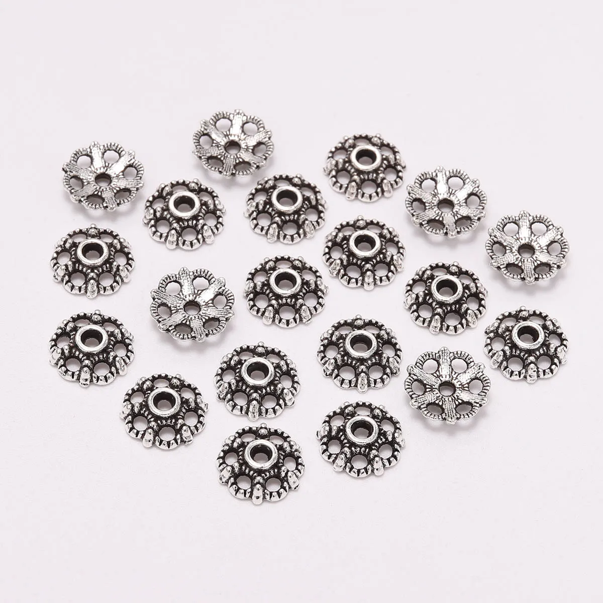 

20pcs/Lot Hollow Out Flower Loose Sparer 11mm Antique Tibetan Torus End Bead Caps For DIY Needlework Making Earrings Finding