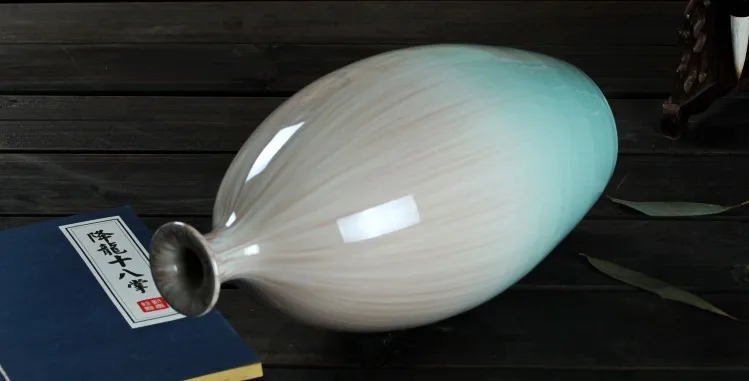

Art Kiln Transmutation Ceramic Vase Decoration Flower Glaze Olive-Shaped Vase Modern Fashion Home Decoration Porcelain Crafts
