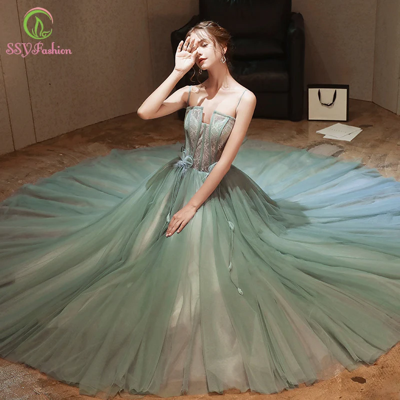 Женское вечернее платье SSYFashion светло зеленое на бретелях спагетти без рукавов