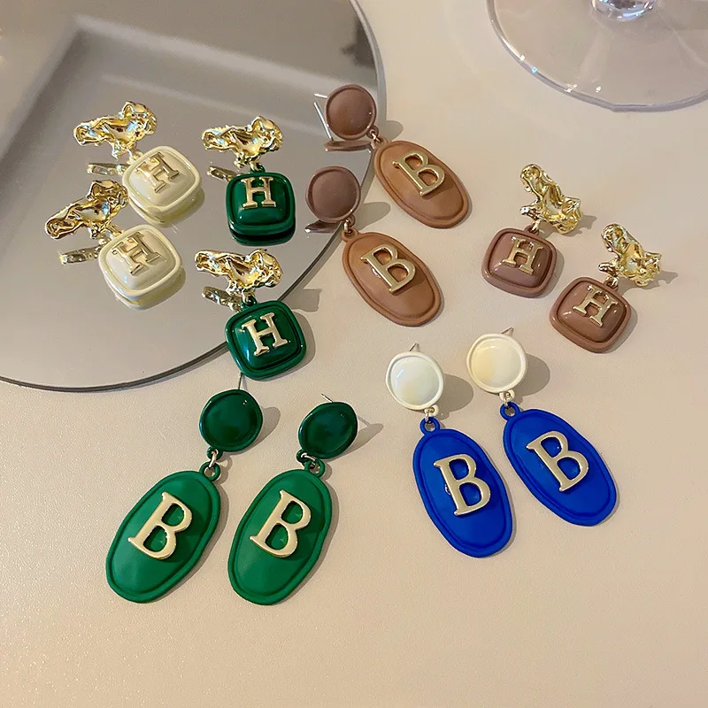

Серьги женские из серебра 925 пробы с буквами-иглами