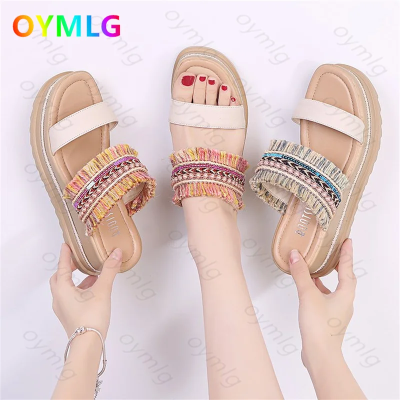 

Wedge slippers female summer wear 2021 new female students bohemian style sponge cake thick bottom ins sandals female trend