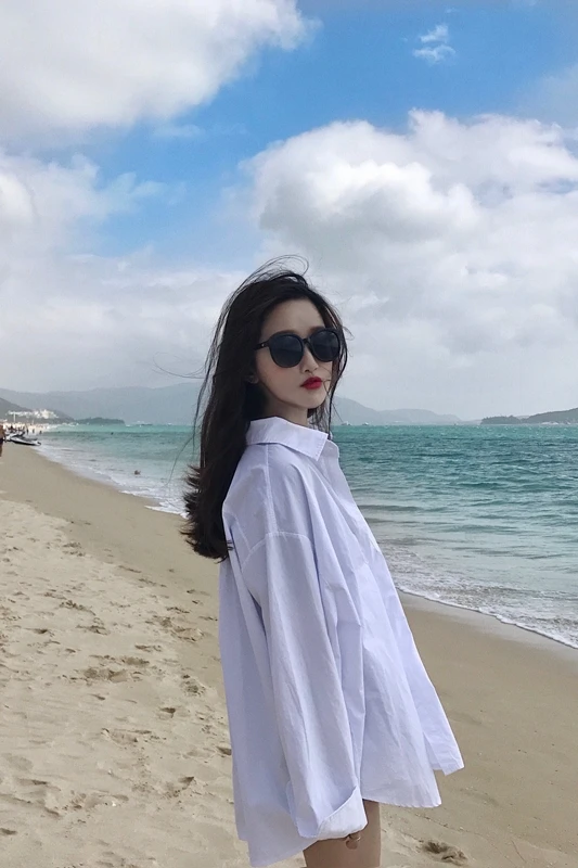 

Early autumn 2021 new Korean chic loose medium length long sleeve white shirt Hong Kong Style sunscreen coat women's summer
