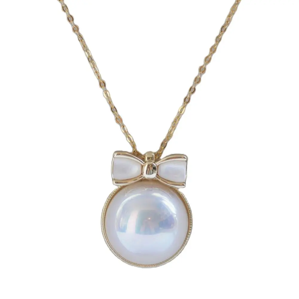

MCT·STAR Z11109 Lustre 16mm White Shell Mabe Pearl Bowknot Chain Pendant CZ