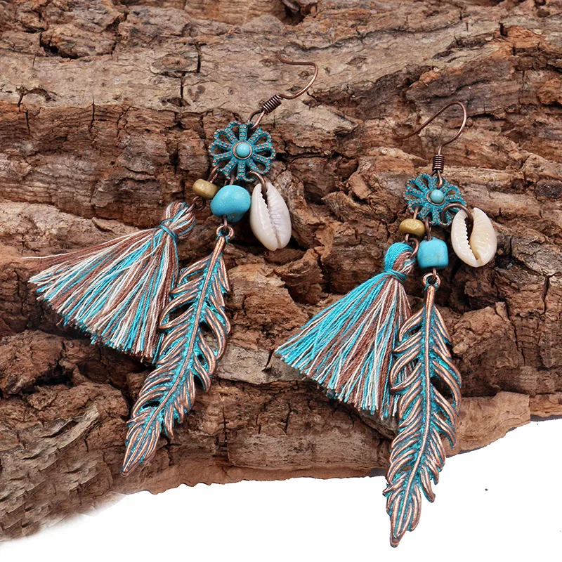 Синие серьги гвоздики с кисточками цветами перьями ракушками подвесками птицами