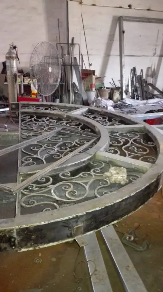 

Hench wrought iron doors design With dual panel glass delivery to Australia house