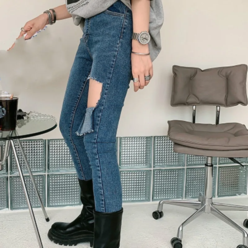 

IEQJ Blue Denim Asymmetrical Hole Pencil Pants New Casual All Match High Waist Loose Women Trousers Fashion Summer 2021 3F0007