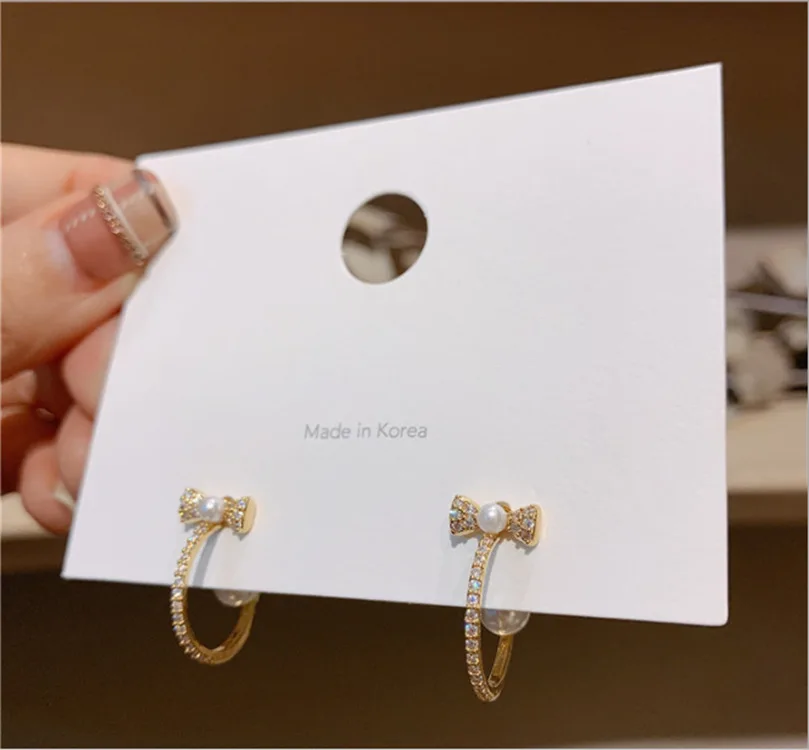 

S925 silver needle French bow full diamond earrings wind small circle pearl girl heart fairy temperament oval earrings