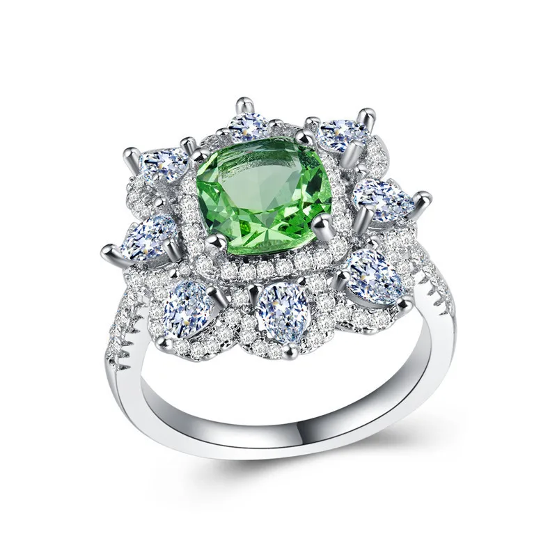 

European and American hot style luxury and elegant ladies ring apple green zircon platinum plated ball pie
