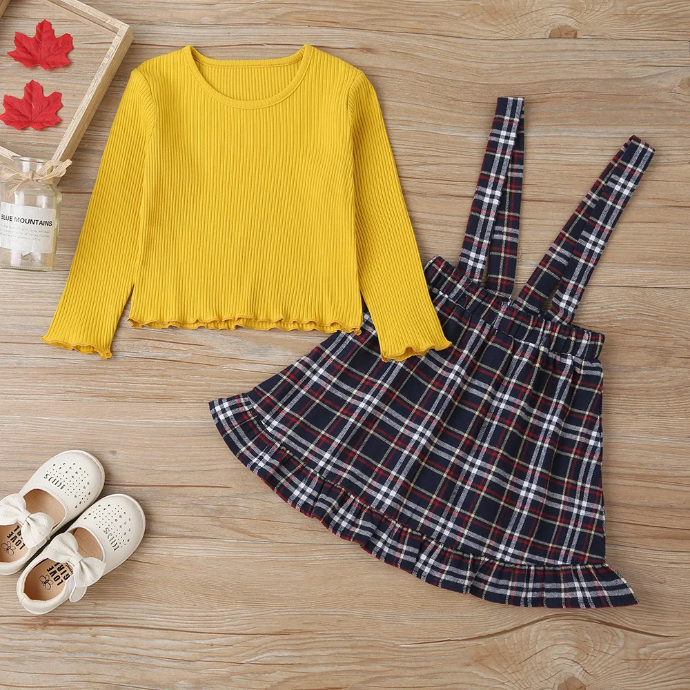 

Autumn 2021 New Arrivals Girls Casual Fashion Long Sleeve Solid Yellow O Neck Plaid Braces Skirt Suit 1-6T