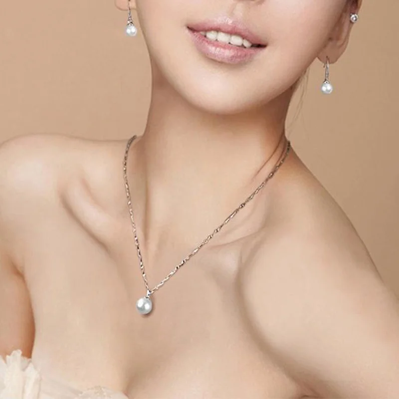 

Cool Crystal Saturn Planet Pearl Pendant Peal Necklace for Women Shining Heart Planet Pendant Choker Neck Chain Jewelry Gift