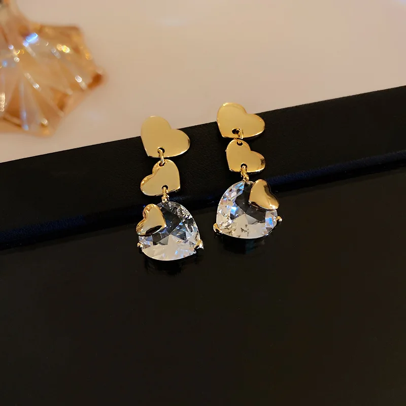 

Minar Unique Design Perspective Crystal Love Heart Dangle Earrings for Women Gold Color Heart Long Tassel Earrings Oorbellen