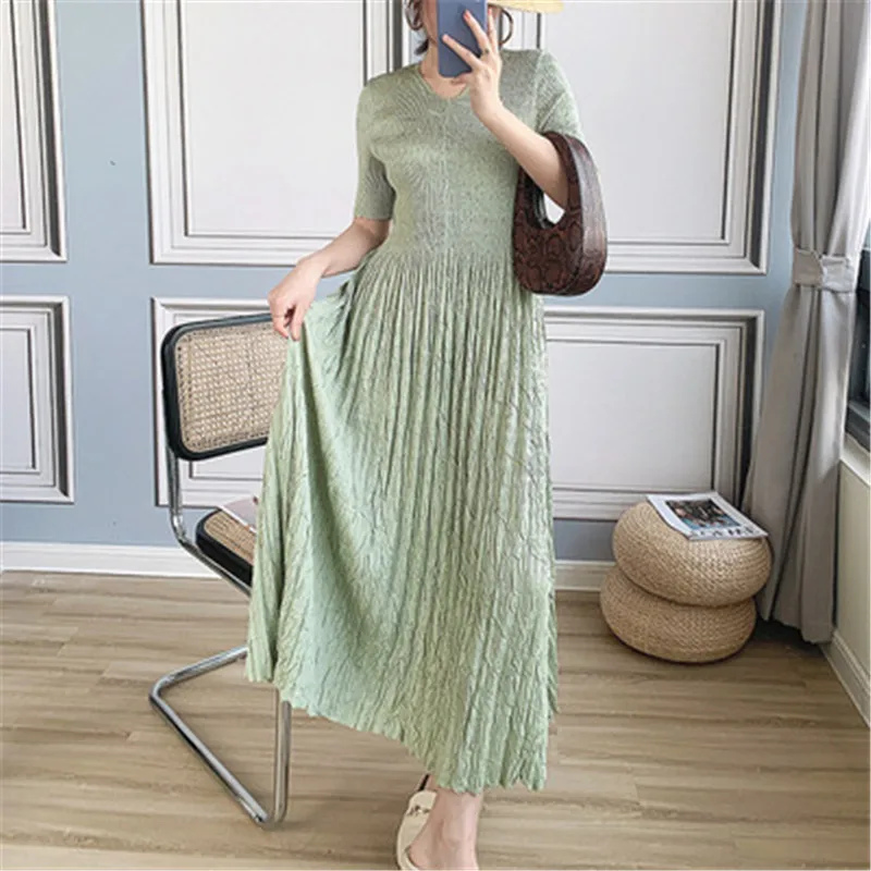 

Miyake pleated women's dress women's short-sleeved mid-length 21 new three-fold pleated temperament fashion pleated dress women