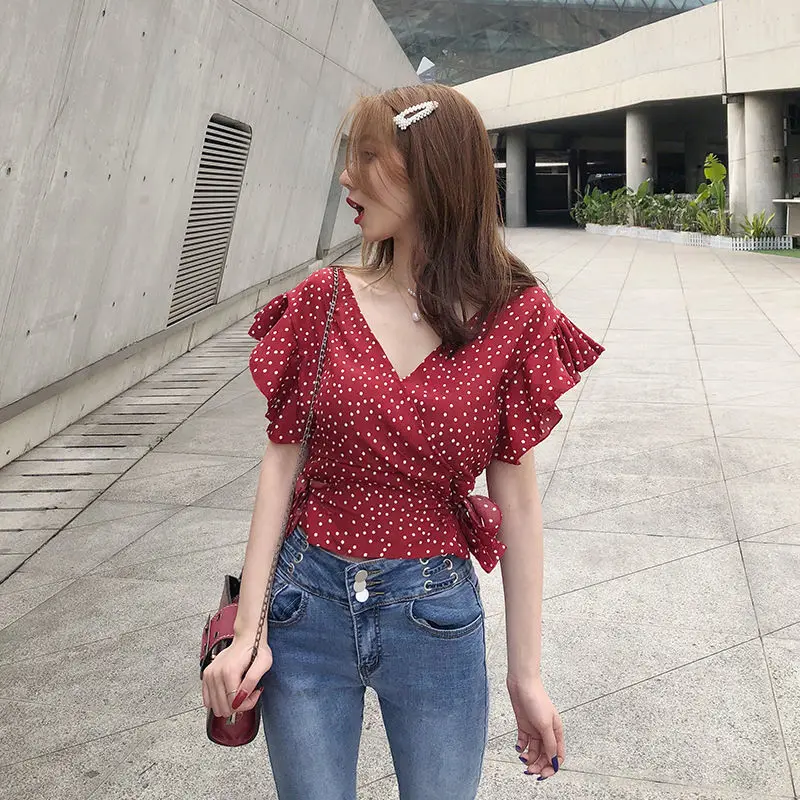 

2021 Korean Version Of Sweet Polka Dots V-Neck Wave Sleeves Elastic Pleated Belt Bow Short Chiffon Shirt Top Ladies Polo Shirt