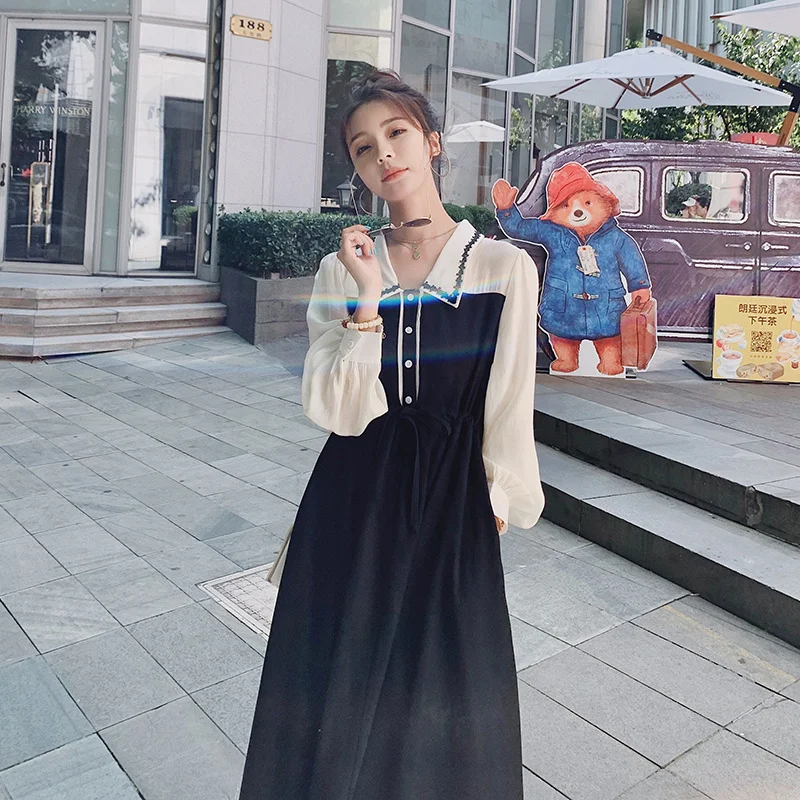 

Большие товары в основном стимулируют черно-белое элегантное платье из двух частей без шнурков