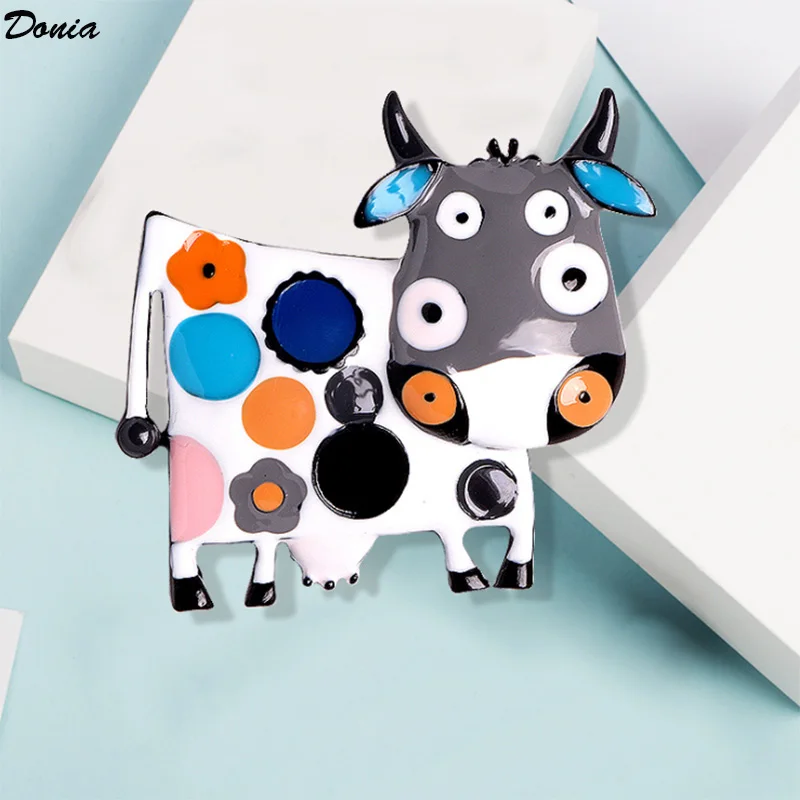 

Donia Jewelry European and American cute cow brooch alloy enamel corsage pin cartoon girl animal custom high-end brooch