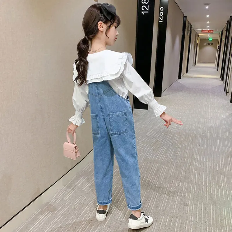 

Kids girls leisure suits Spring / autumn long-sleeved white shirt + denim overalls 2pcs sets of new large child sports suit