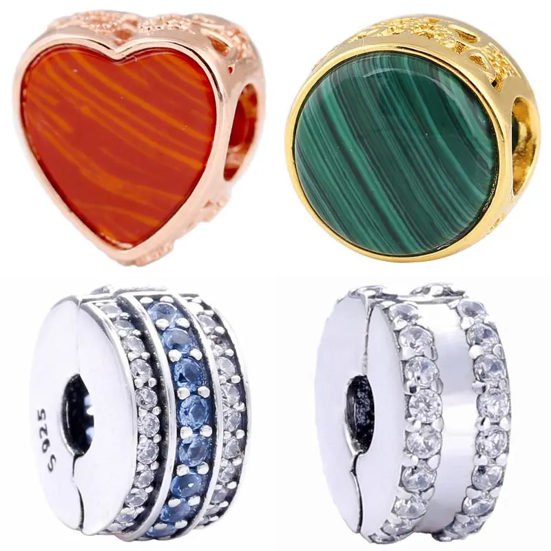 

Розовое золото, красное сердце, оставшееся зеленое муранское стекло, подвески, прозрачная и синяя линия, зажим, подходящий для фотографий