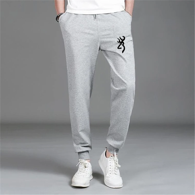 

Autumn Winter New Fashion Women Sweatpants Printed Joggers Pants Mens Casual Fitness Long Bottoms Sportwear Trousers (S-4XL)