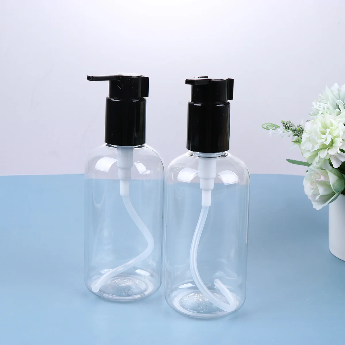 

4pcs 250ml Portable Lotion Storage Bottle Useful Cosmetics Perfume Dispenser (250ml Transparent Bottle and Black Pump Head)