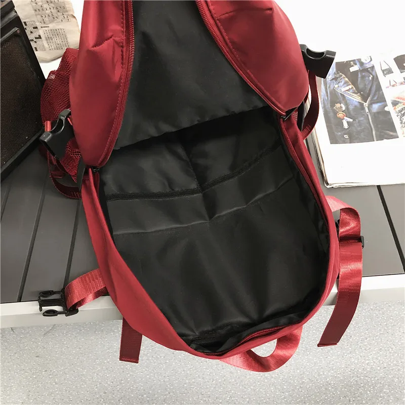 

Large capacity Unisex Fashion backpack Teenagers Boy Girl Schoolbag Nylon waterproof travel bag Simple multi-pocket bag 2020 New