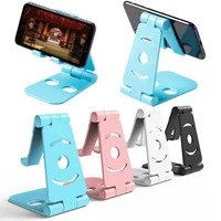 universal portable mobile phone stand desktop tablet pc phone stand abs folding portable mobile phone stand lazy charging stand