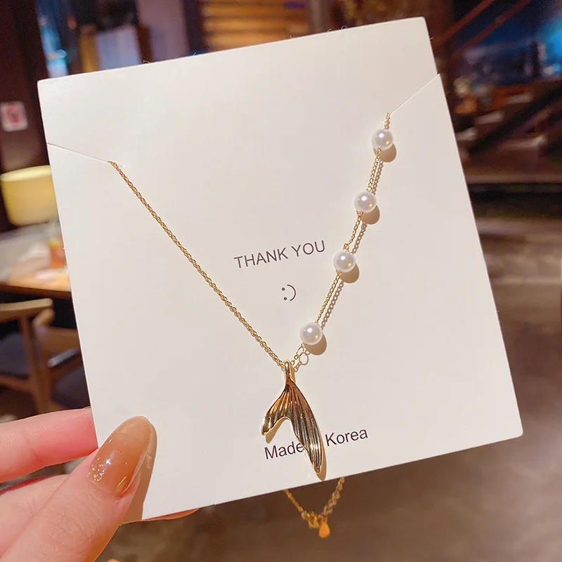 

South Korea's new fashion personality pearl fishtail titanium steel pendant necklace female temperament all-match necklace