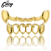 gucy hip hop teeth grills gold color plated half fang slim top hollow fang lower bottom vampire teeth grillz set gift party