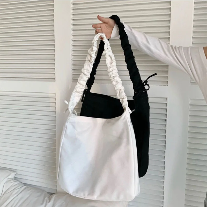 

Large-capacity canvas fold bag, single-shoulder portable, simple personality, all-match messenger bag, student school bag all ye