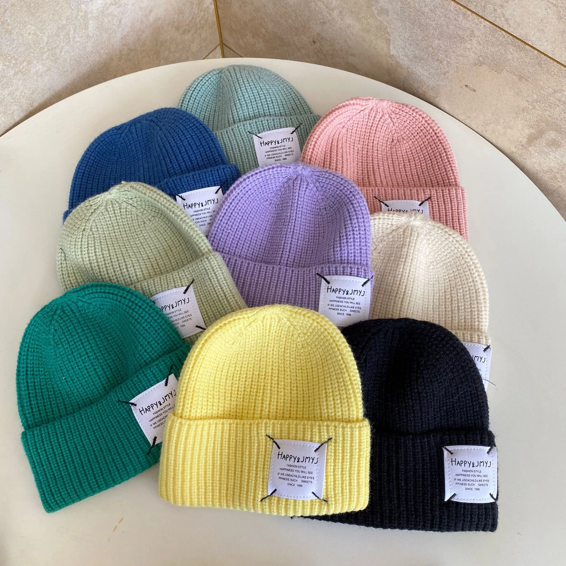 

South Korea's new autumn and winter sewing leather label letter wool hat for men and women versatile thickened warm knit hat