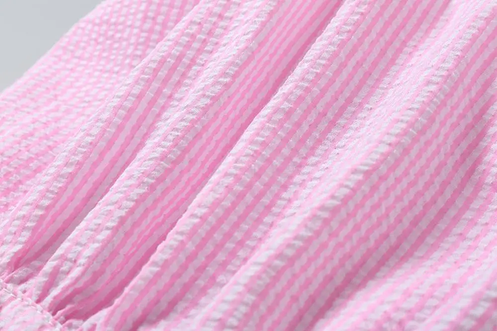 Комбинезон для девочек с оборками без рукавов в полоску большим бантом летний