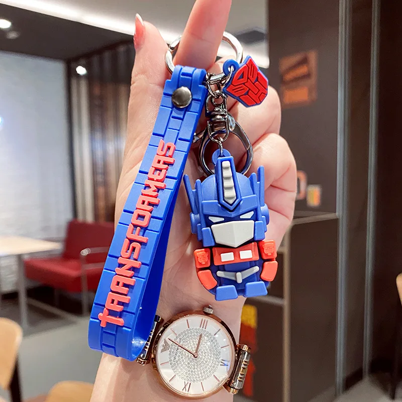

Individual Cartoon cartoon Transformers pendant Key chains Boys Campus backpack Accessories Creative key ring Free mail
