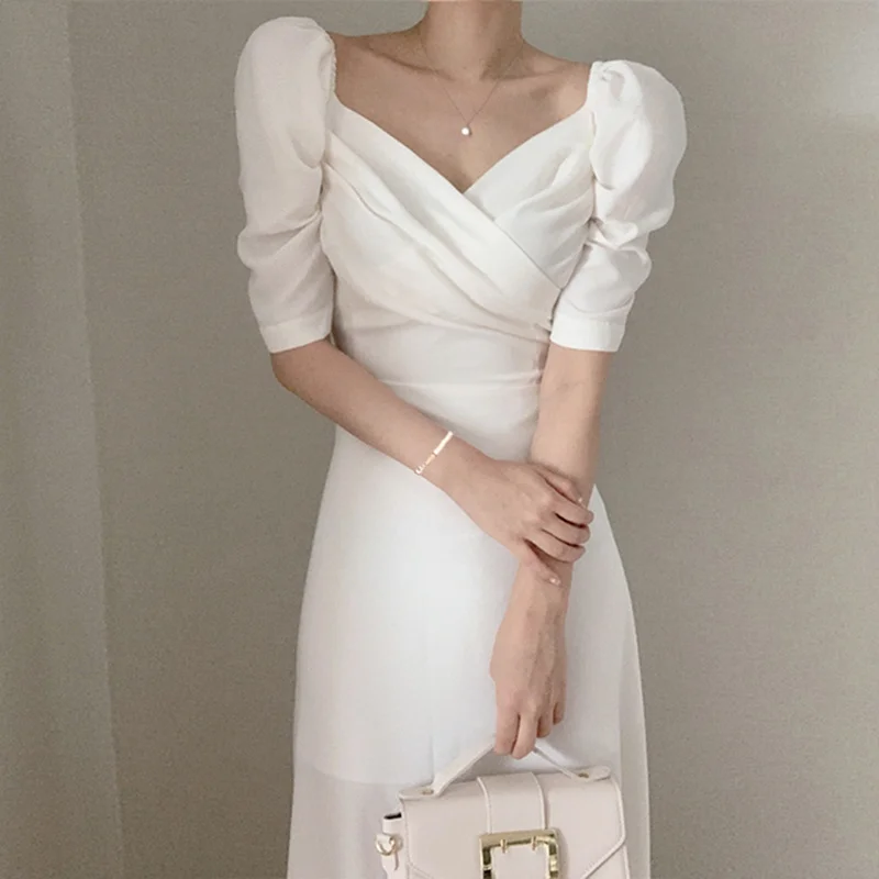 

Summer New Korean Design Sense Retro Expose Clavicle V-neck Design Puff Sleeve Mid-Length White Dress fafa_ootd