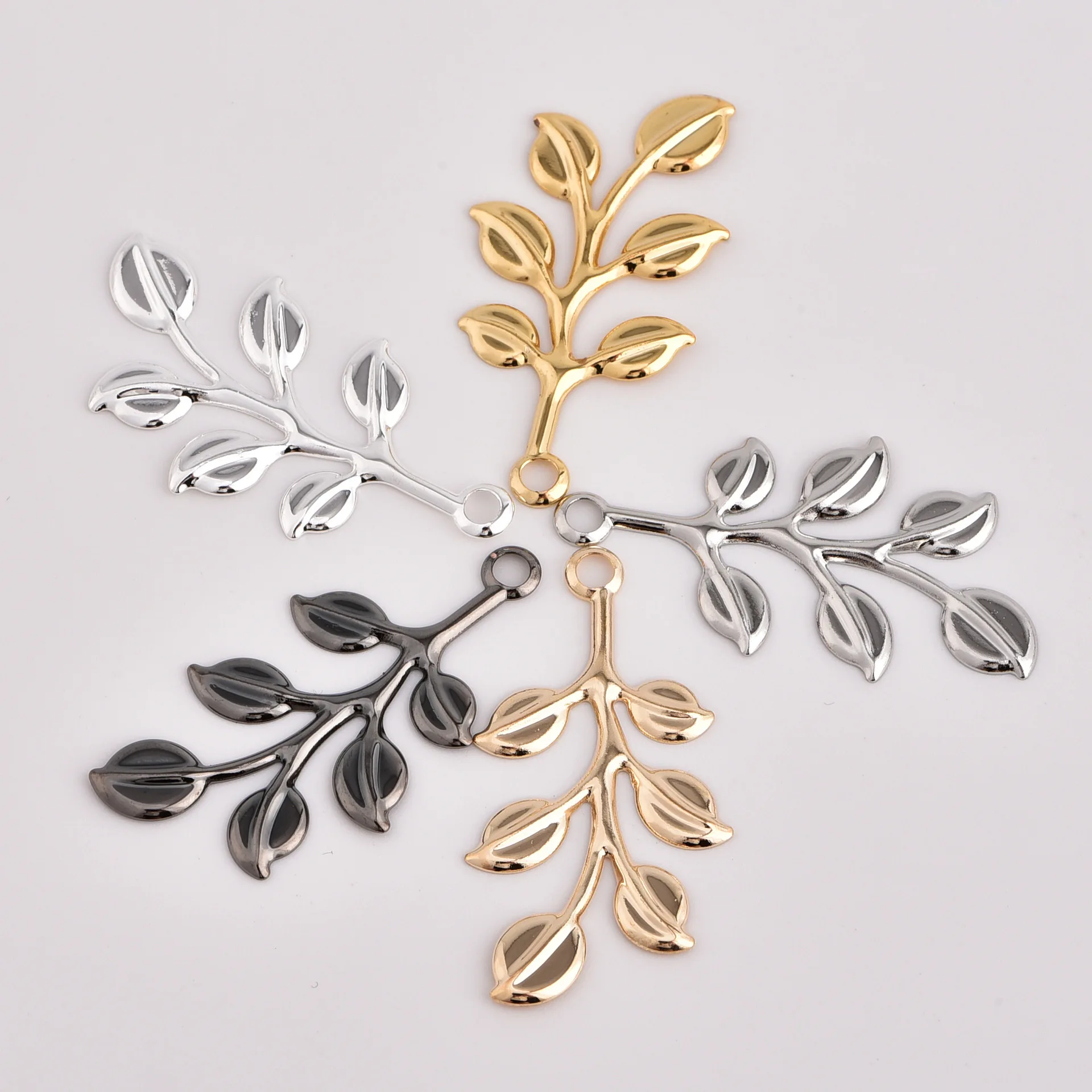 

3.9*2.1*0.3CM 50Pc/bag Jewelry accessories multiple leaves earrings ear hook ear clip pendant