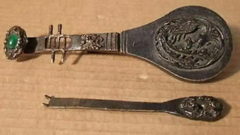 

Rare old style brass carved lute the Phoenix lock and key