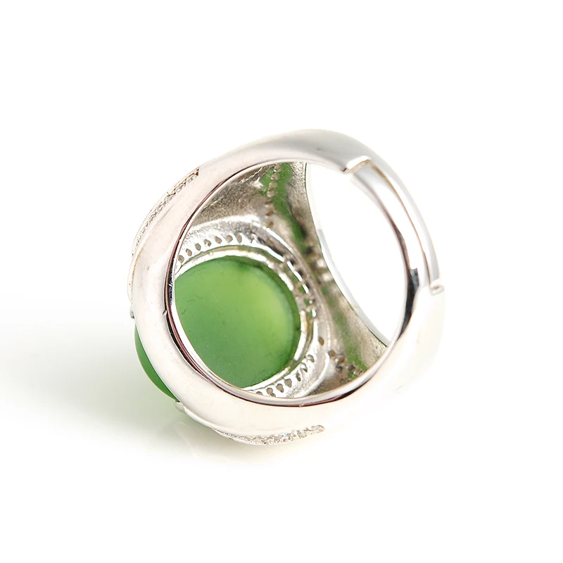 Кольцо из натурального нефрита инкрустированное серебром 925 пробы