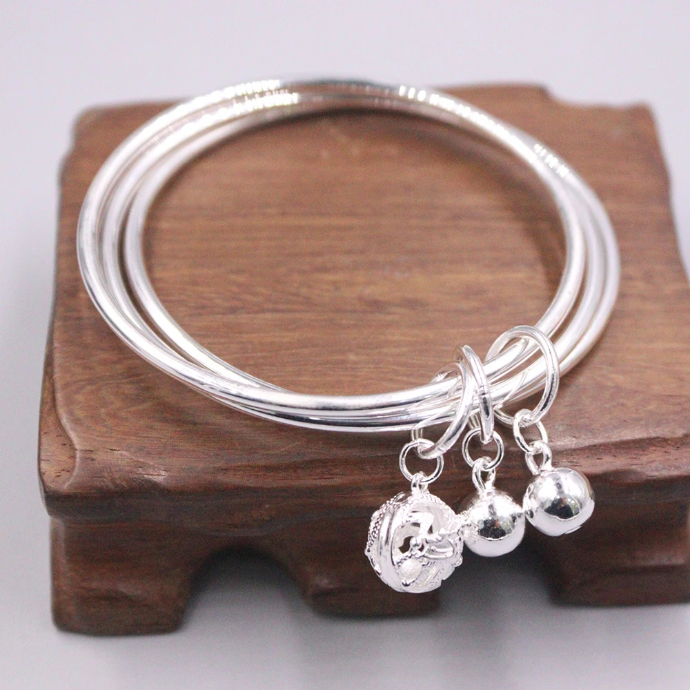 

Free Shipping S999 Fine Silver Bangle Women Luck Hollow Ball Charm Three Pieces Smooth Bangle 58mm 6.5mmW 33-34g