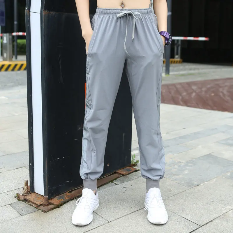 Светоотражающие женские штаны Джоггеры со светоотражающими полосками