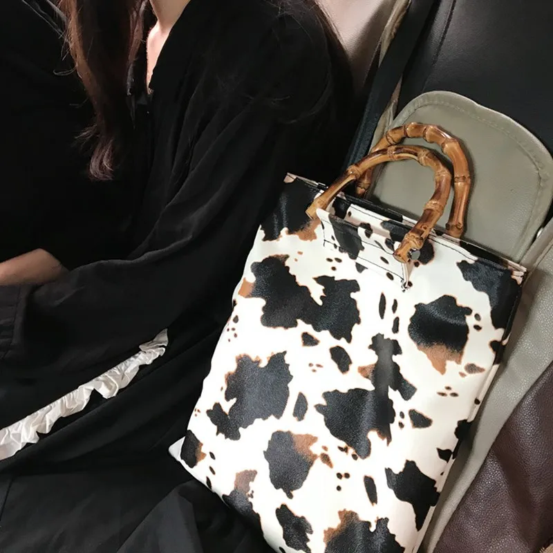 

2020 new ins wind bag female retro milk cow pattern large capacity bamboo handbag fashion bolsa feminina torebki damskie