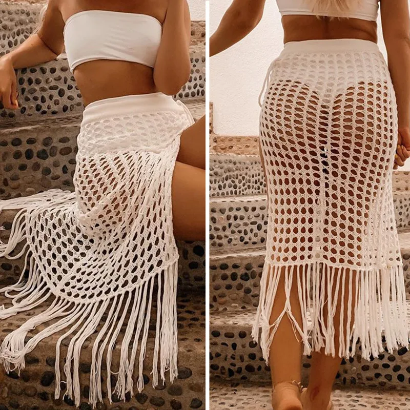

Vamos Todos 2021 Summer Solid Bathing Suit Women Hollow Out White Coverup Swimwear Split Tassels Crochet Beach Swimsuit Cover Up