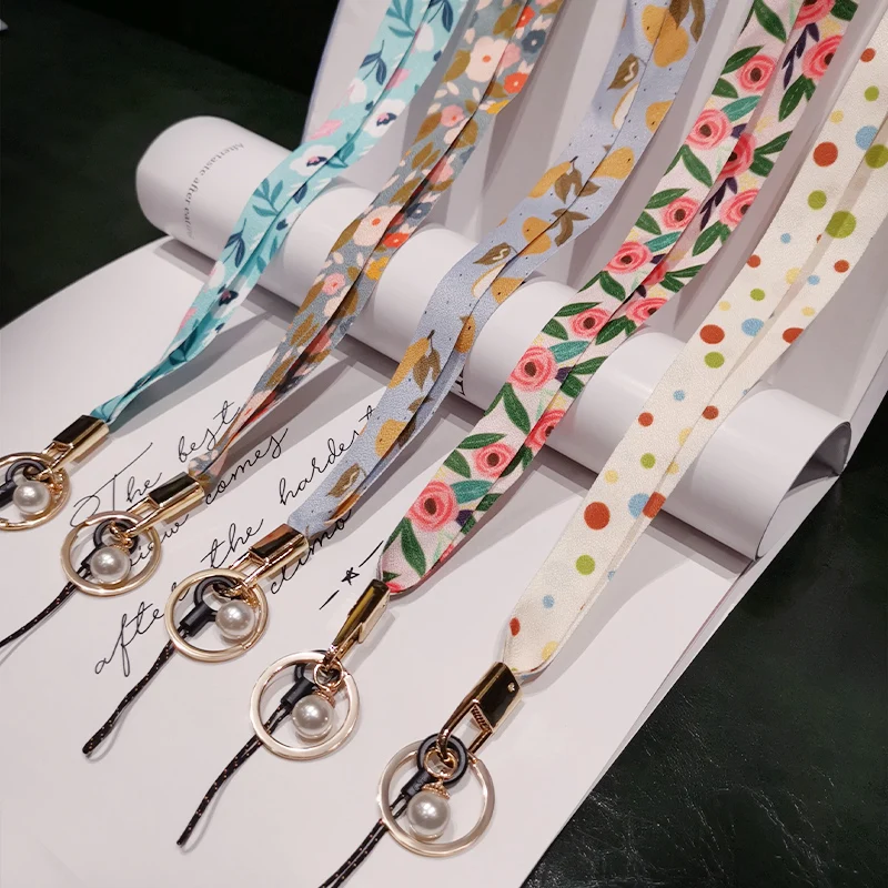 

Suitable for iphone Huawei Redmi Samsung Xiaomi mobile phone ID card pearl long lanyard flower printed mobile phone lanyard