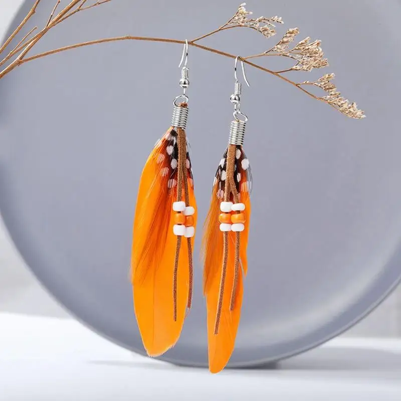 

Boho Long Retro Women Earrings Fashion Beaded Tassel Fake Feather Drop Earrings Dangle Earrings For Women 2020 Jewelry Gift