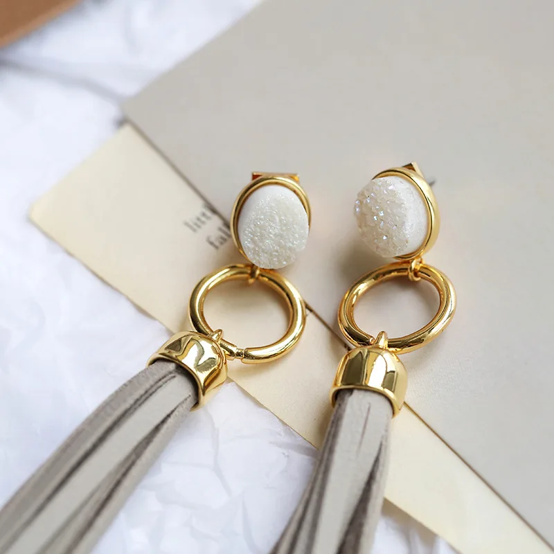 

European and American designer style leather tassels Earrings female fashion temperament circular tassels long earrings