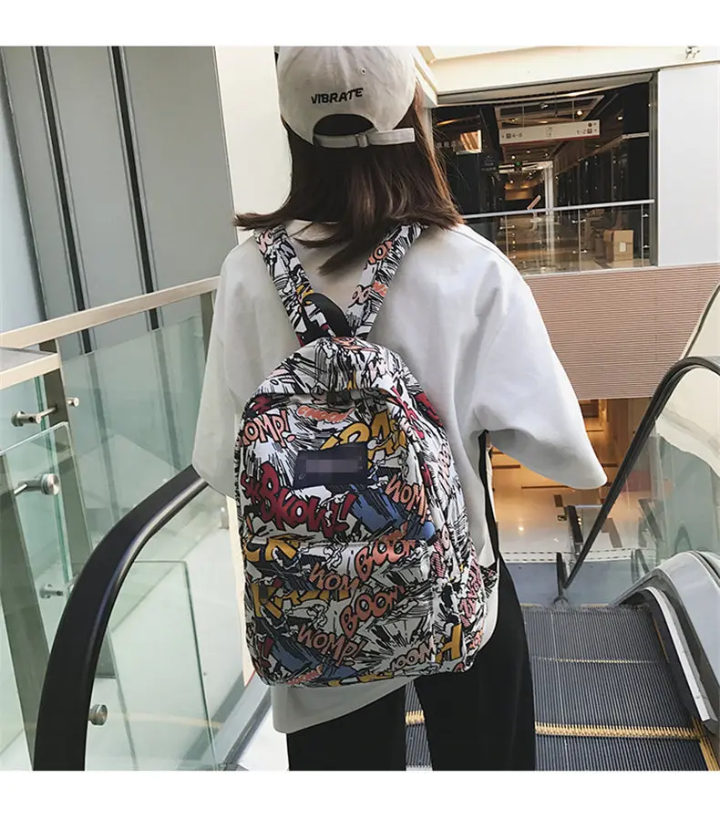 New backpack female cartoon alphabet doodle personality wild backpack men and women shoulder bag mochila