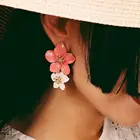 Женские серьги-гвоздики в виде двух цветов