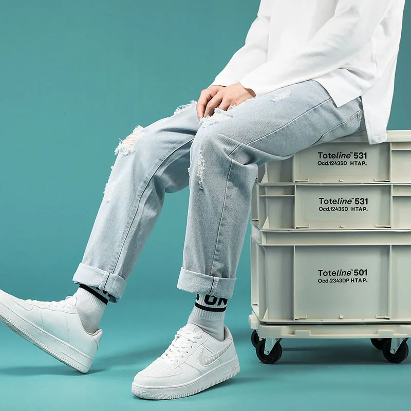 

Jeans men's 2021 new summer thin section Korean style trend loose straight hole nine-point casual long pants