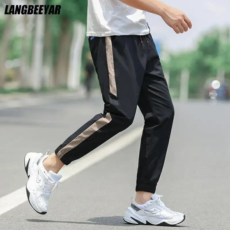 

Top Quality New Designer Brand Casual Fashion Street Style Strappy Pants For Men Cotton Korean Elastic Trousers Men Clothes