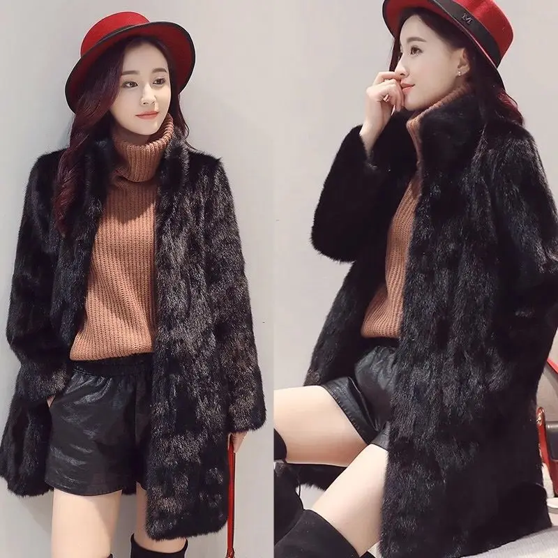 

Mink fur women's medium and long spell mink coat