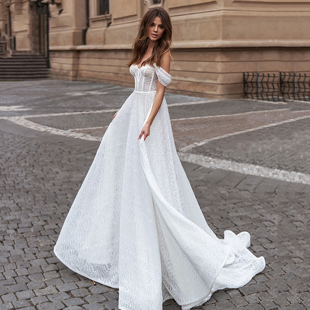 

ТРАПЕЦИЕВИДНОЕ свадебное платье с открытой спиной и аппликацией